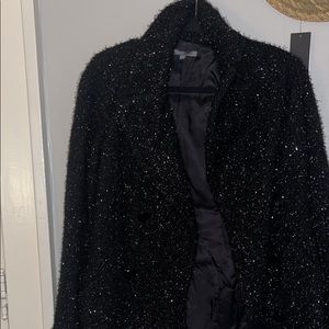 Black pea coat at sparkles in the light